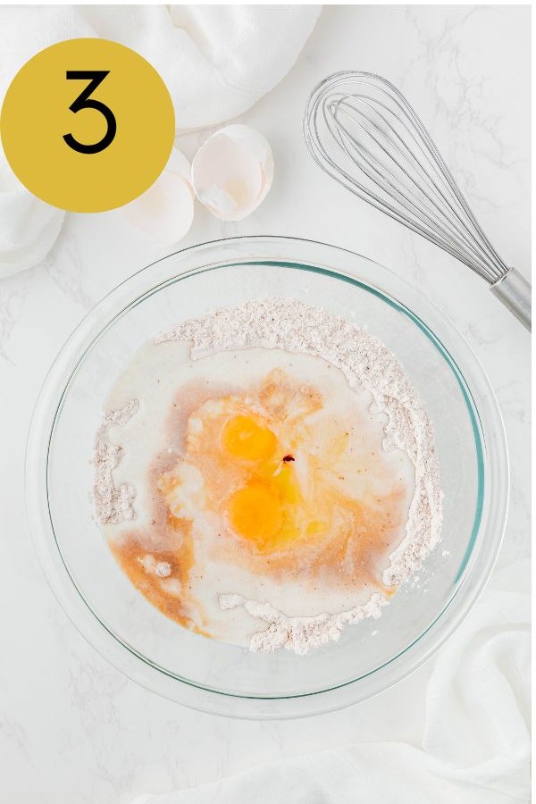 Eggs, milk, buttermilk, vinegar and vanilla added to the dry ingredients.