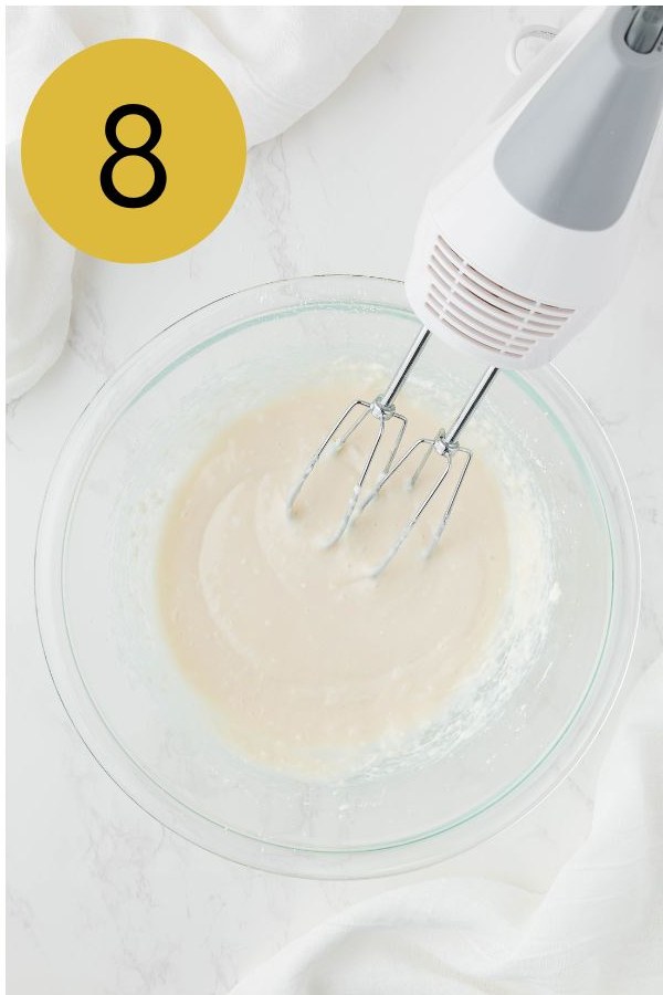 The cream cheese glaze beaten smooth with a hand mixer.