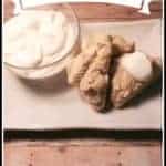 Cream scones and clotted cream on plate