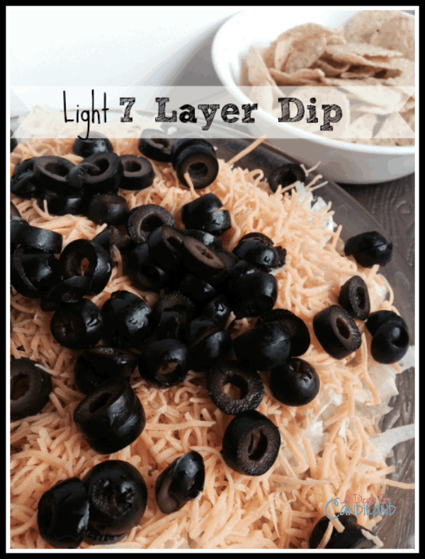 Light 7 layer Mexican dip with baked tortilla chips