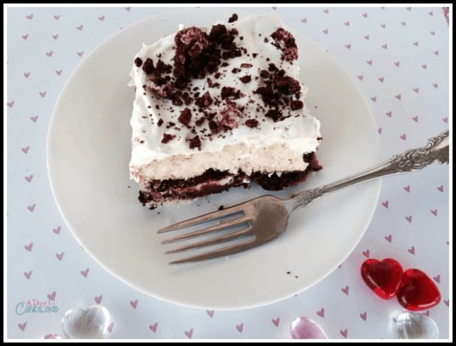 Slice of Red Velvet Oreo Poke Cake