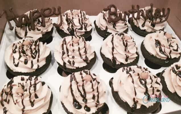 Dark Chocolate cupcake recipe with peanut butter frosting with a chocolate happy birthday note on top