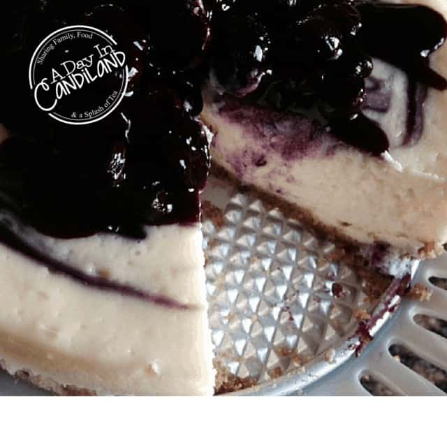 Lemon Blueberry Swirl Cheesecake with missing slice