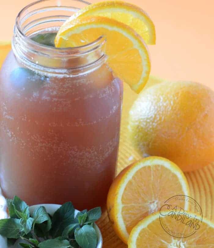 Tropical Orange Iced Tea with mint leaves and oranges