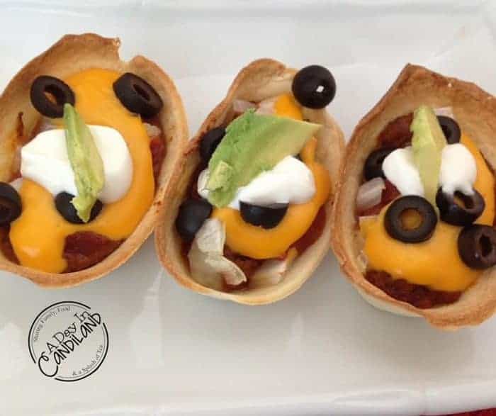 7 layer chili cheese boats in tortilla boats