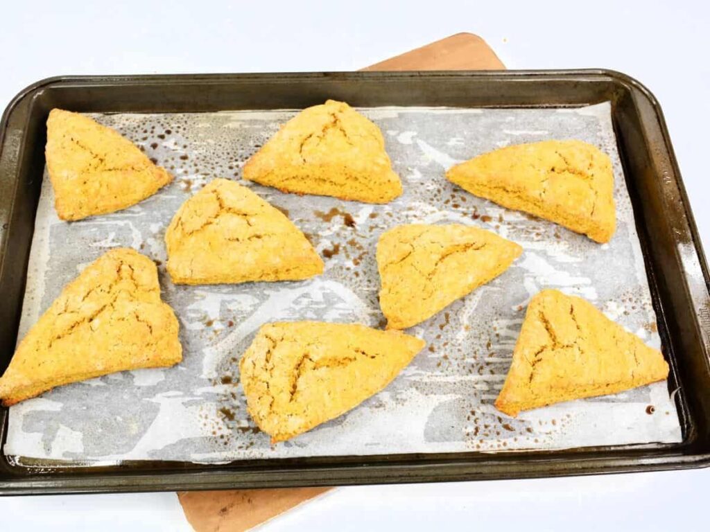 baked scones on a parchment paper on a baking sheet 