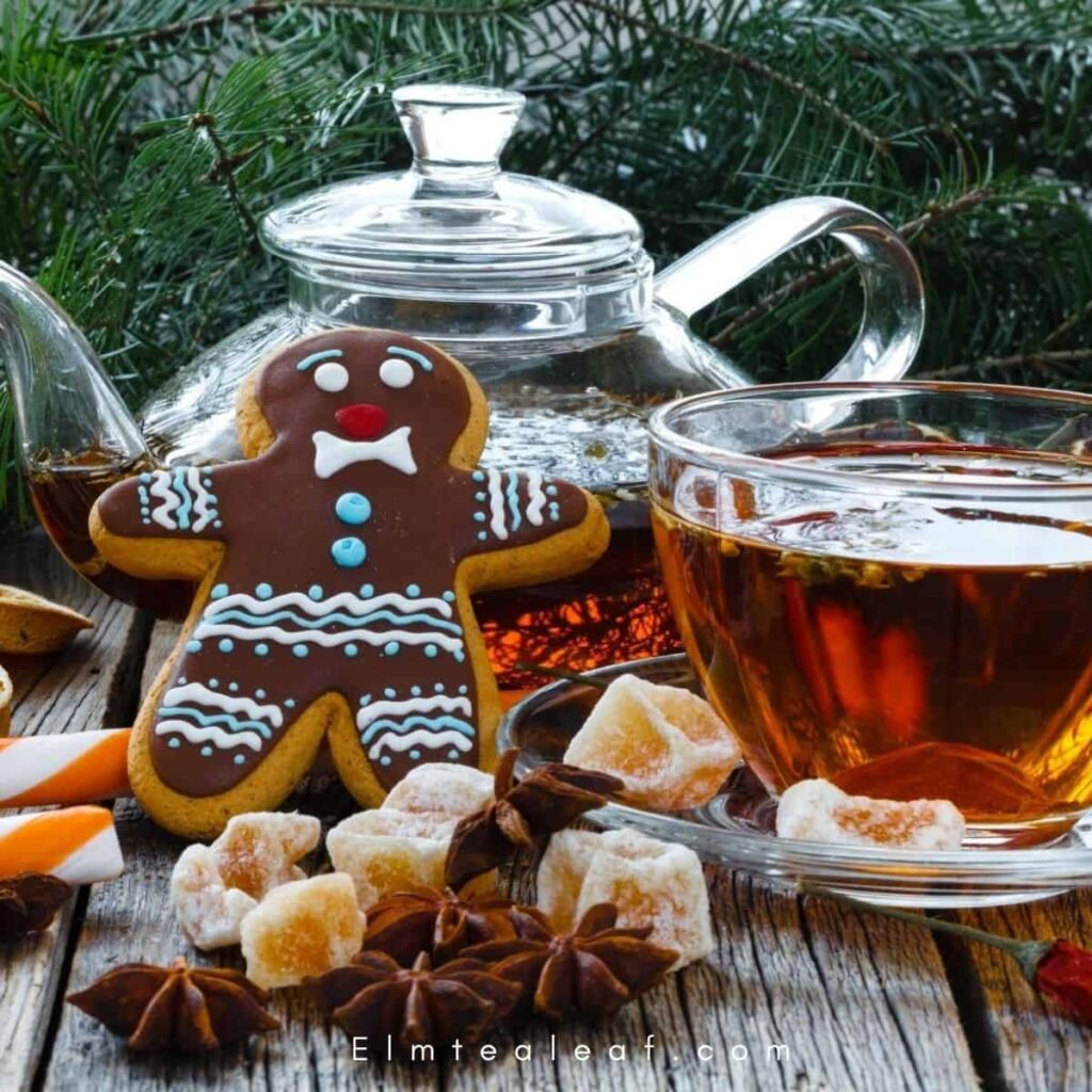 Cup of Tea with Teapot and Gingerbread Man Cookies 