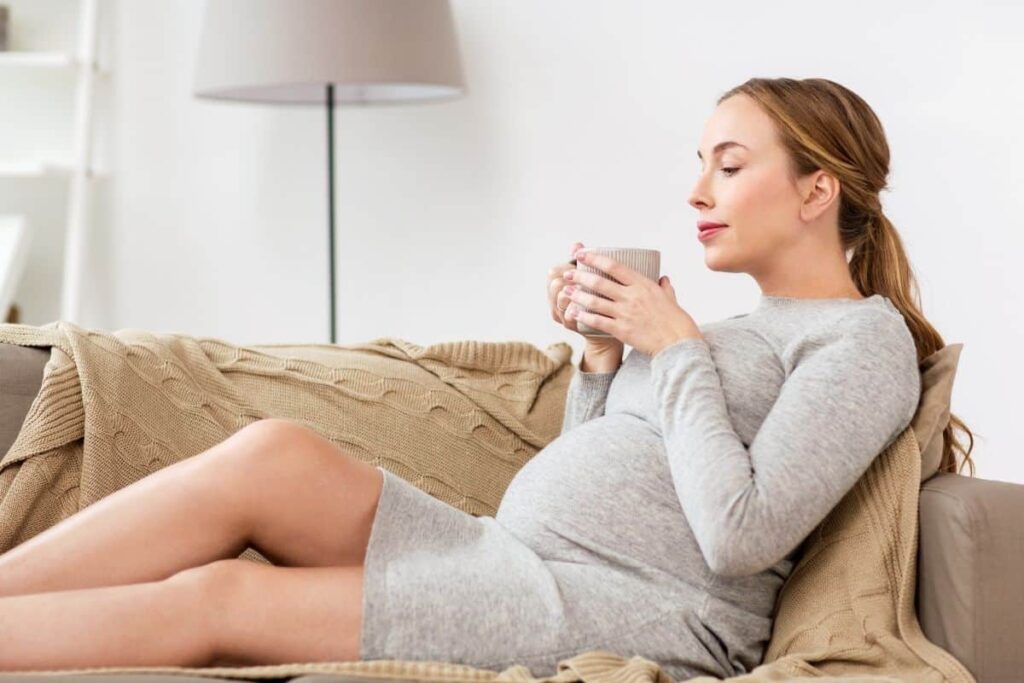 pregnant woman drinking tea