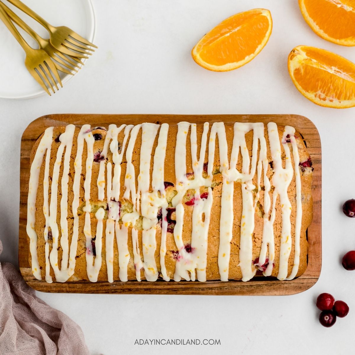 Top of Cranberry Orange Loaf with Orange Glaze drizzle on top. 