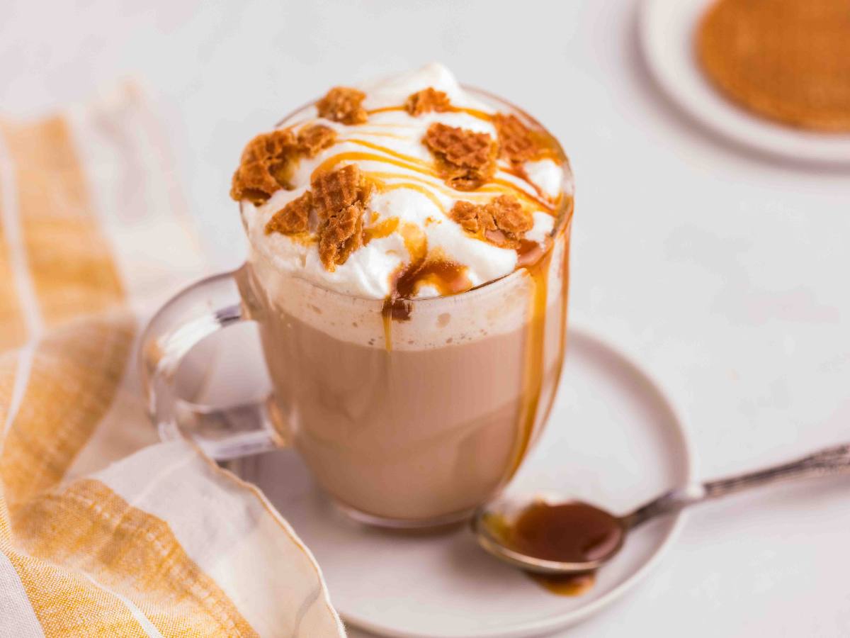 Glass mug of a copycat Starbucks Caramel Cream Brulee Latte. 