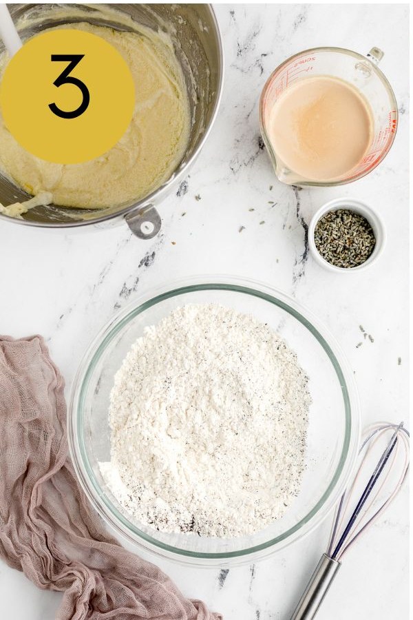 The batter in the mixer with the Earl Grey infused milk and lavender ready for alternating additions.