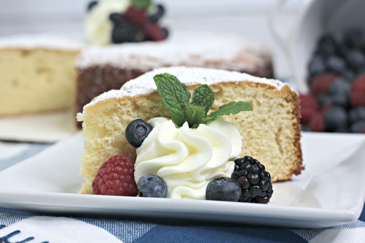 Slice of Afternoon Tea Cake with Berries. 