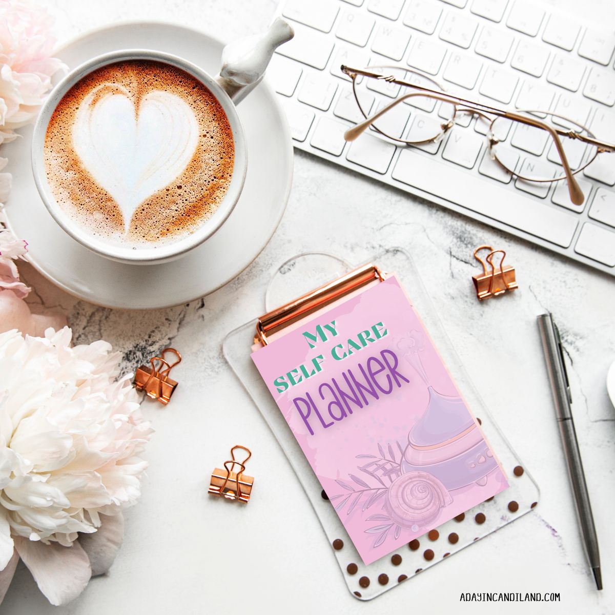 Desk with Coffee cup and clipboard with Self Care Planner on top. 