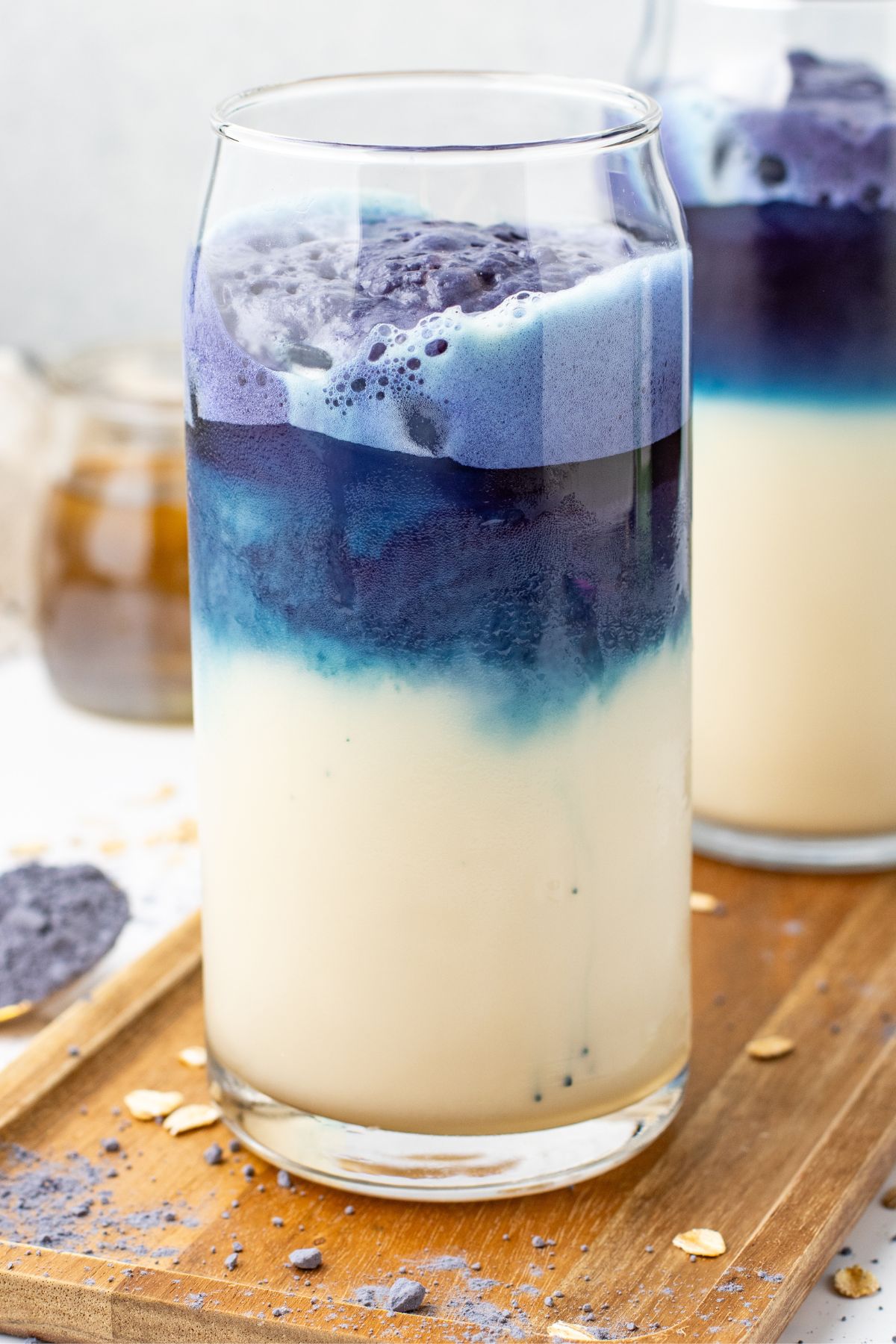 Blue Butterfly Pea Flower Latte in tall clear glasses.