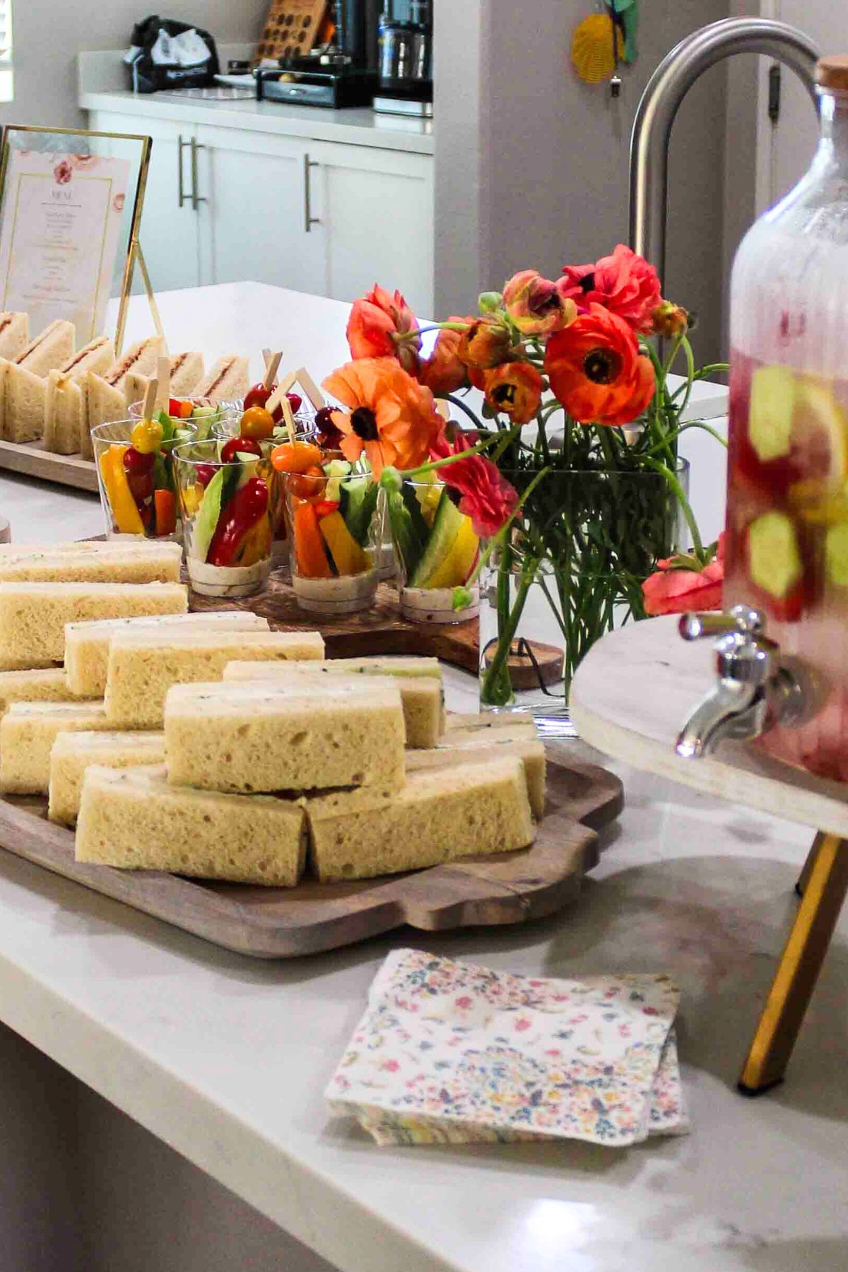 Sandwiches and veggie cups for a tea party. 