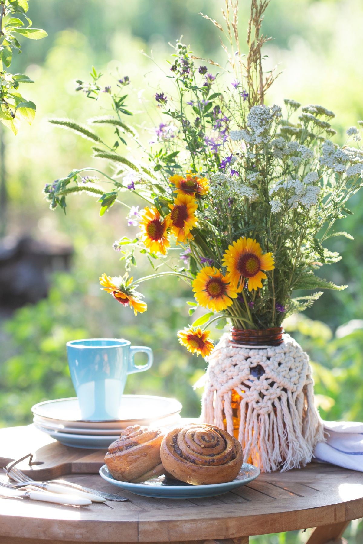 Cinnamon Rolls on a table in a Garden. 