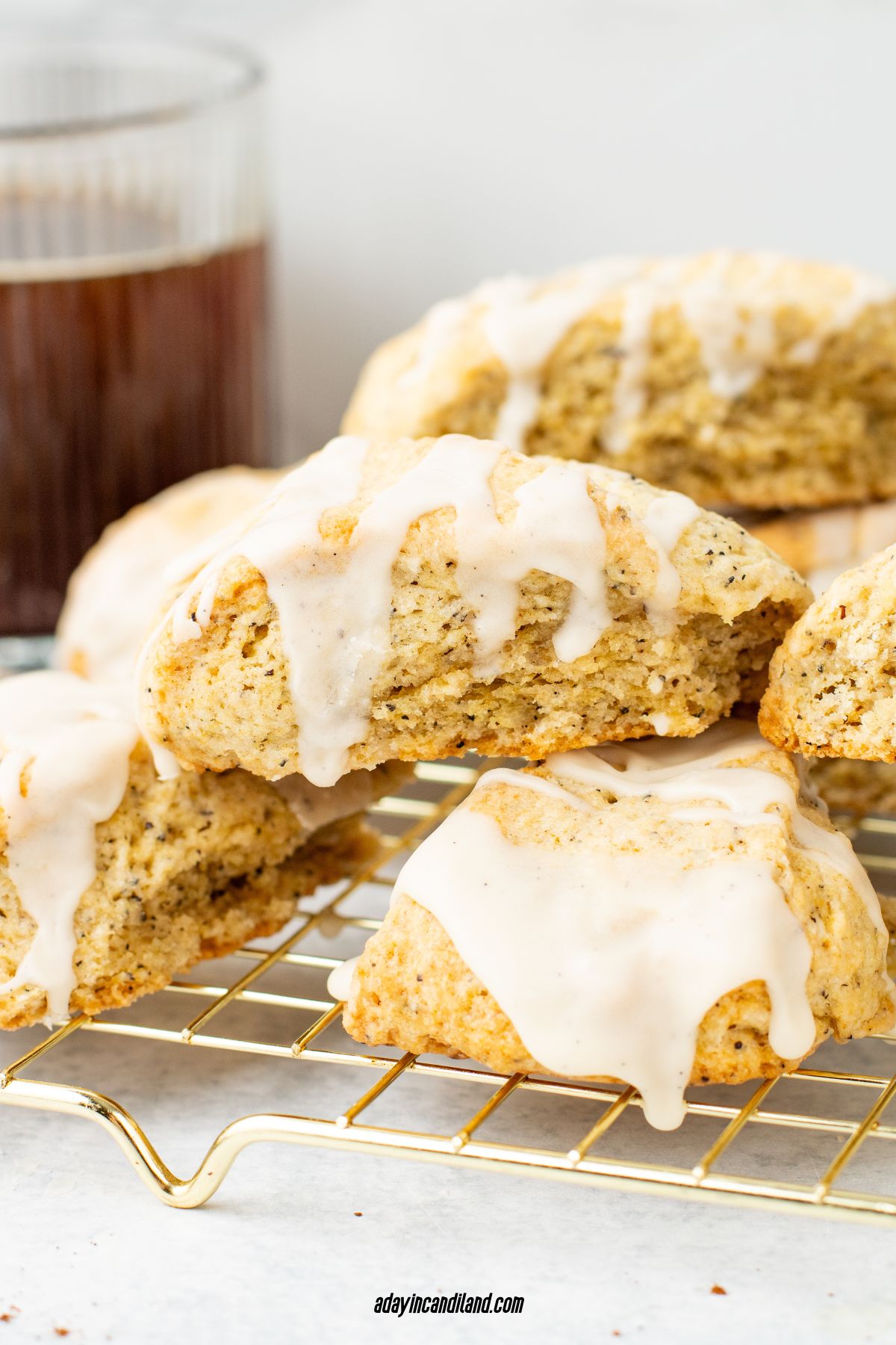 Several Earl Grey Scones stacked on a wire rack. 
