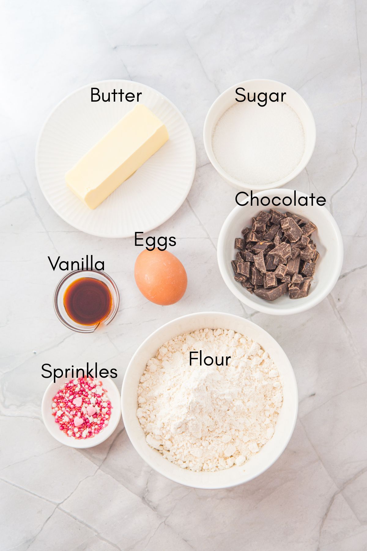 Ingredients on a table for Valentines Sugar Cookies.