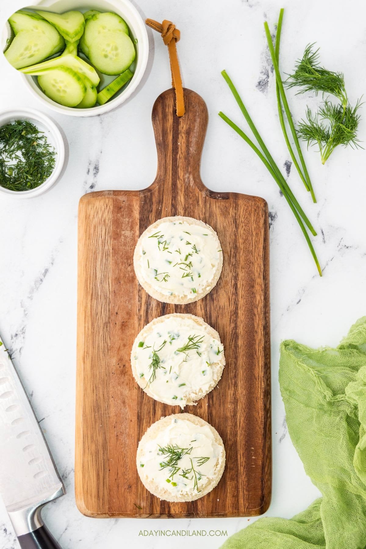 Chopped fresh dill sprinkled over the cream cheese on each round.