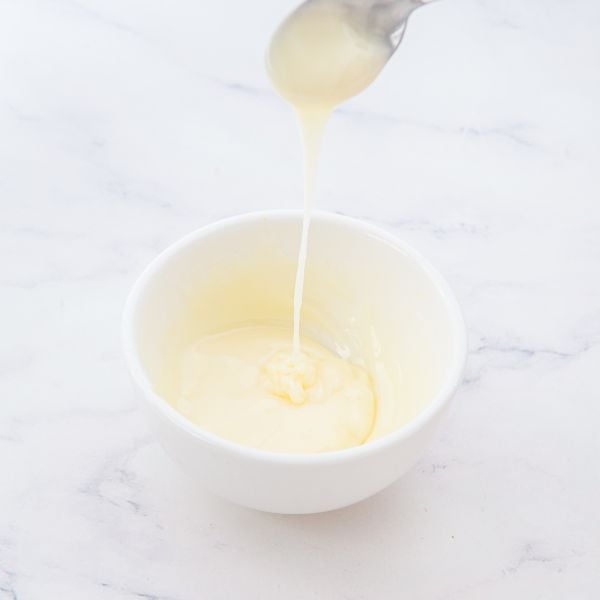 In a separate bowl, make the orange glaze.