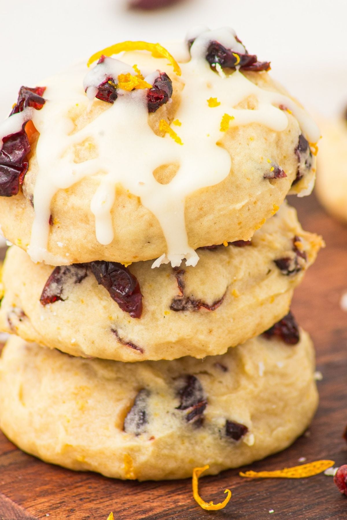 Cranberry orange ricotta cookies with orange glaze and dried cranberries