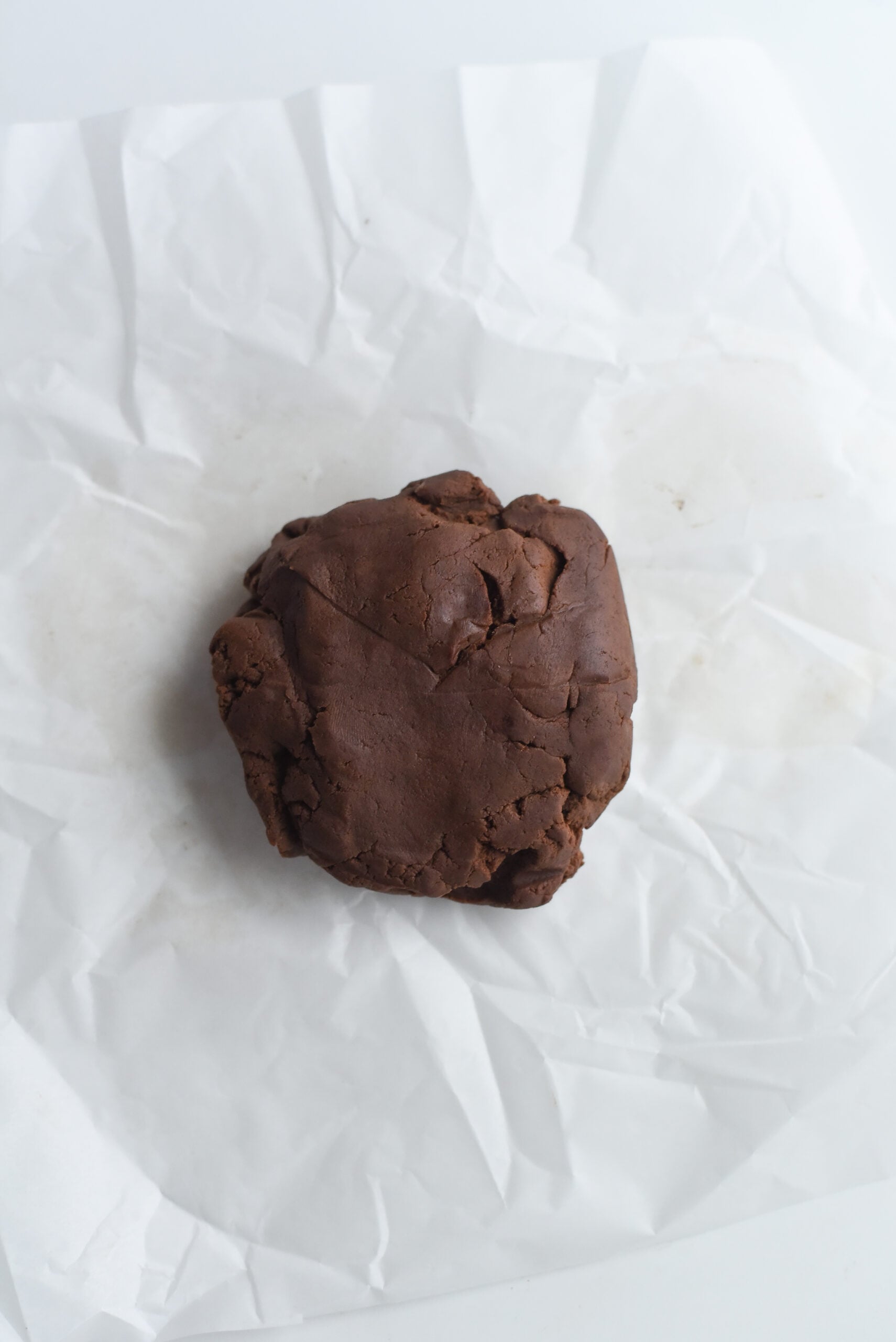 Rolled Cocoa Dough on parchment paper.