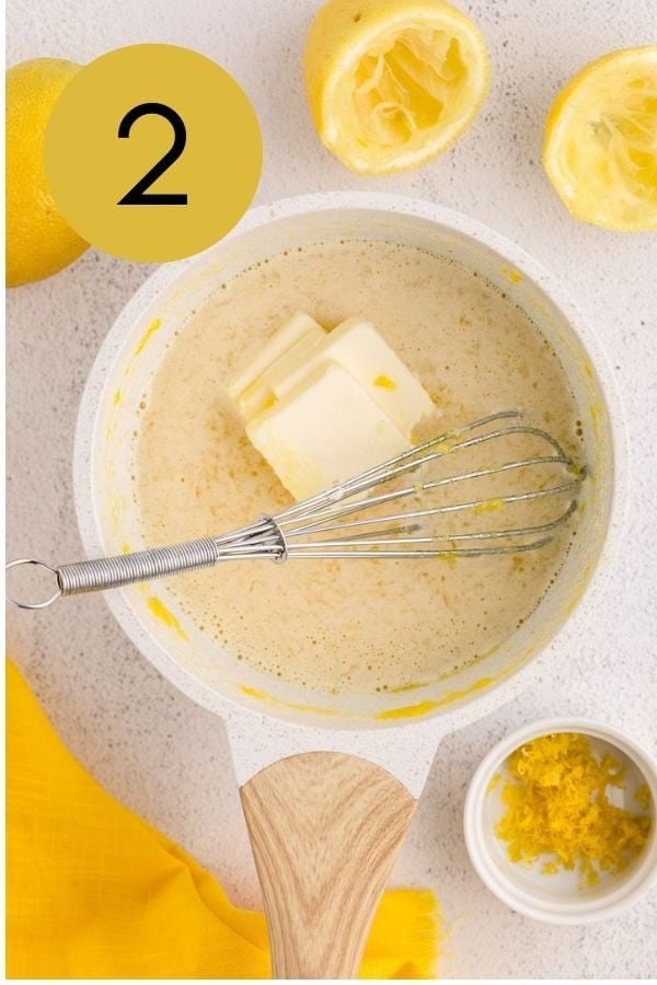 Butter, lemon juice and salt added to the yolk mixture in the saucepan.