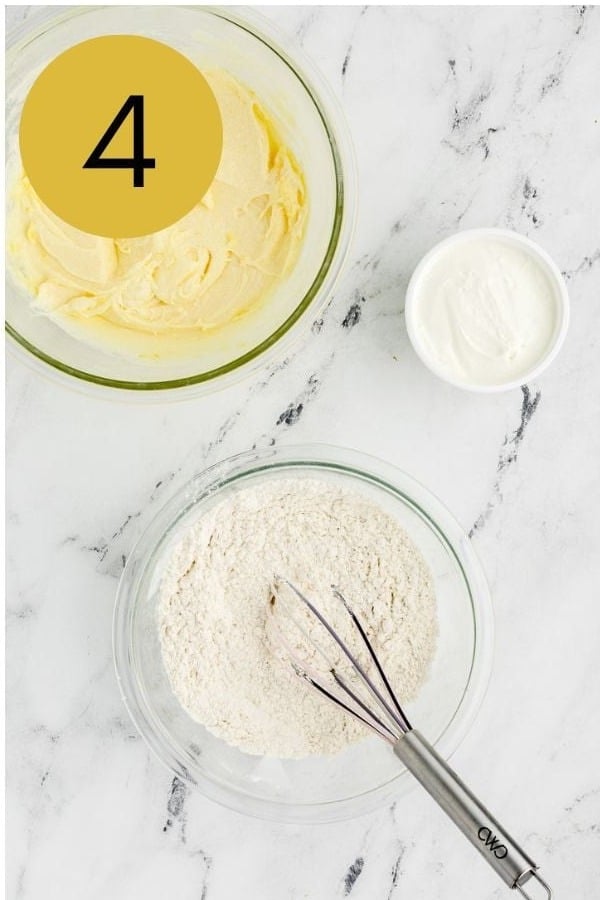Flour, baking powder, baking soda and salt whisked together in a glass bowl.